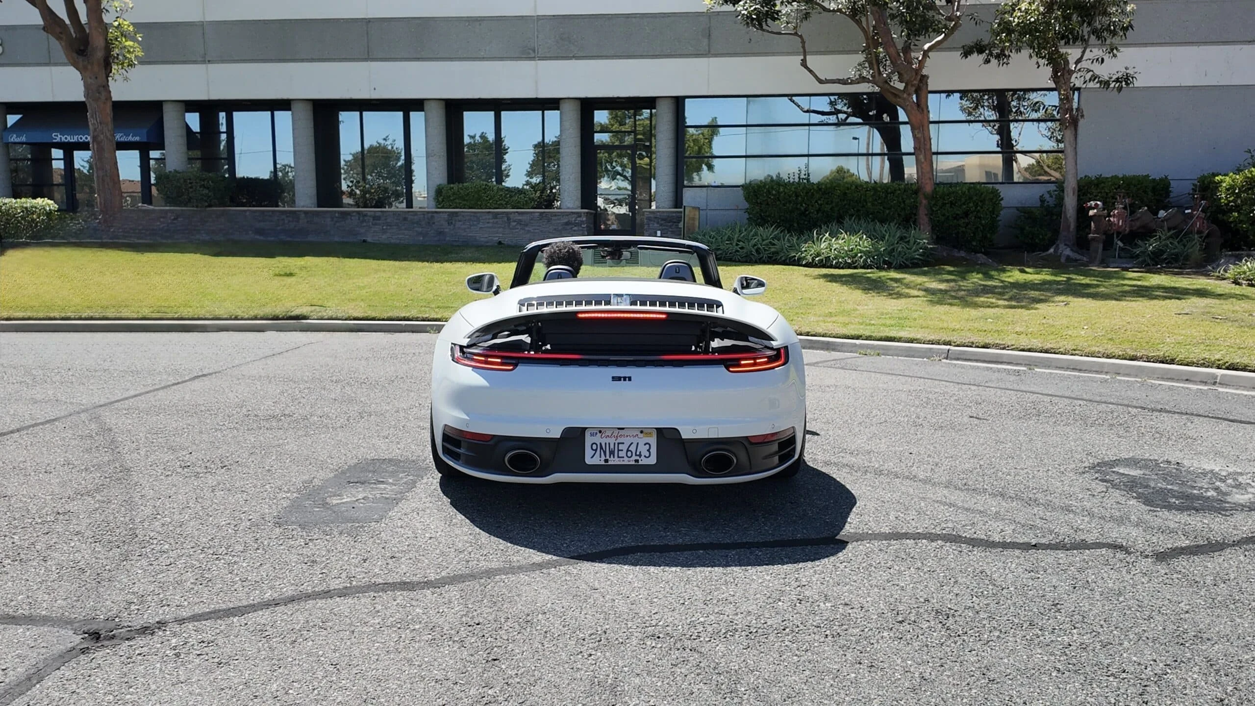 Porsche 911 Carrera 4S Cabriolet detail relevant to all-wheel-drive performance car rentals on LUX / CAR / RENTAL